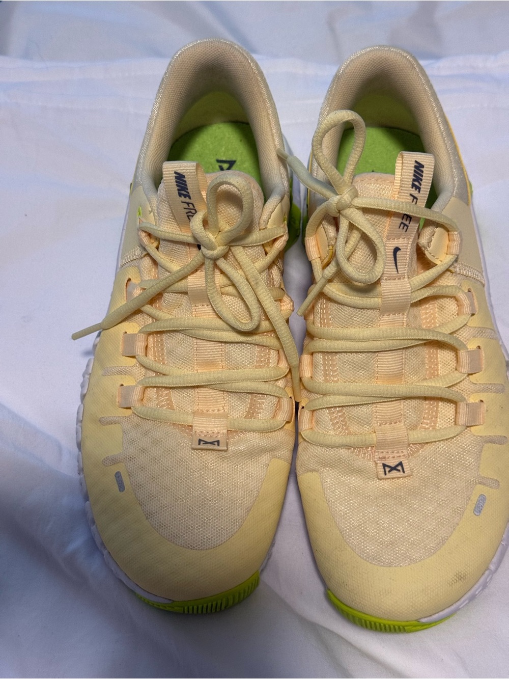 Nike Women’s Pale Yellow Athletic Sneakers